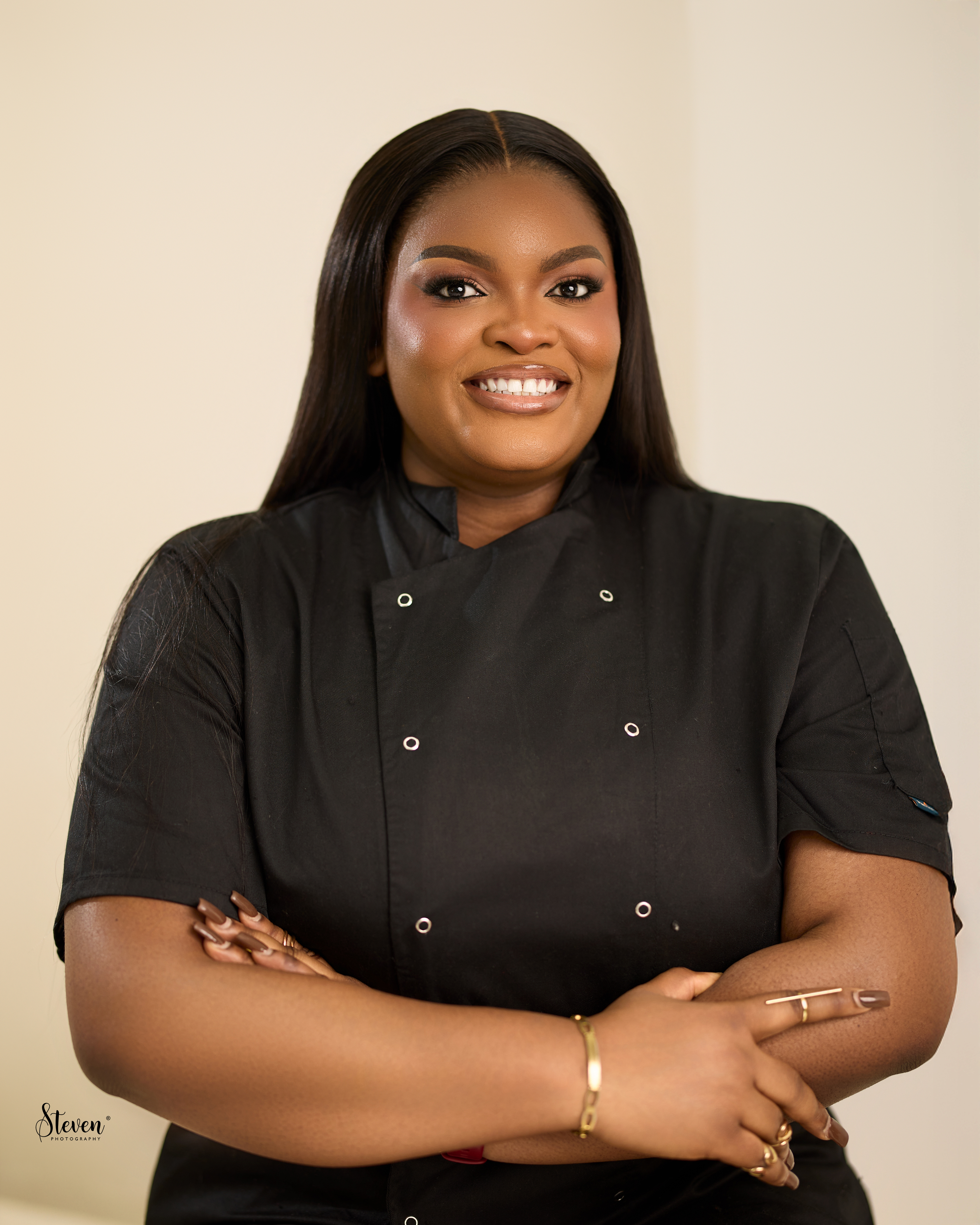 The chef behind Noa's Delights, in her kitchen whites