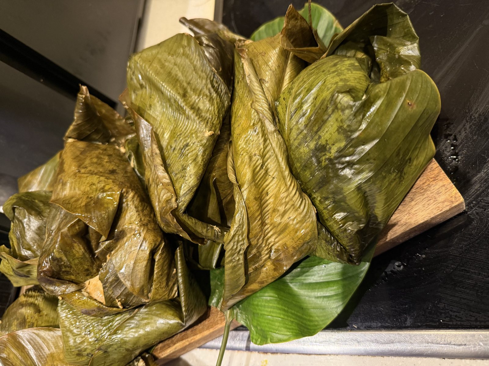 Moi moi wrapped and steamed in banana leaves