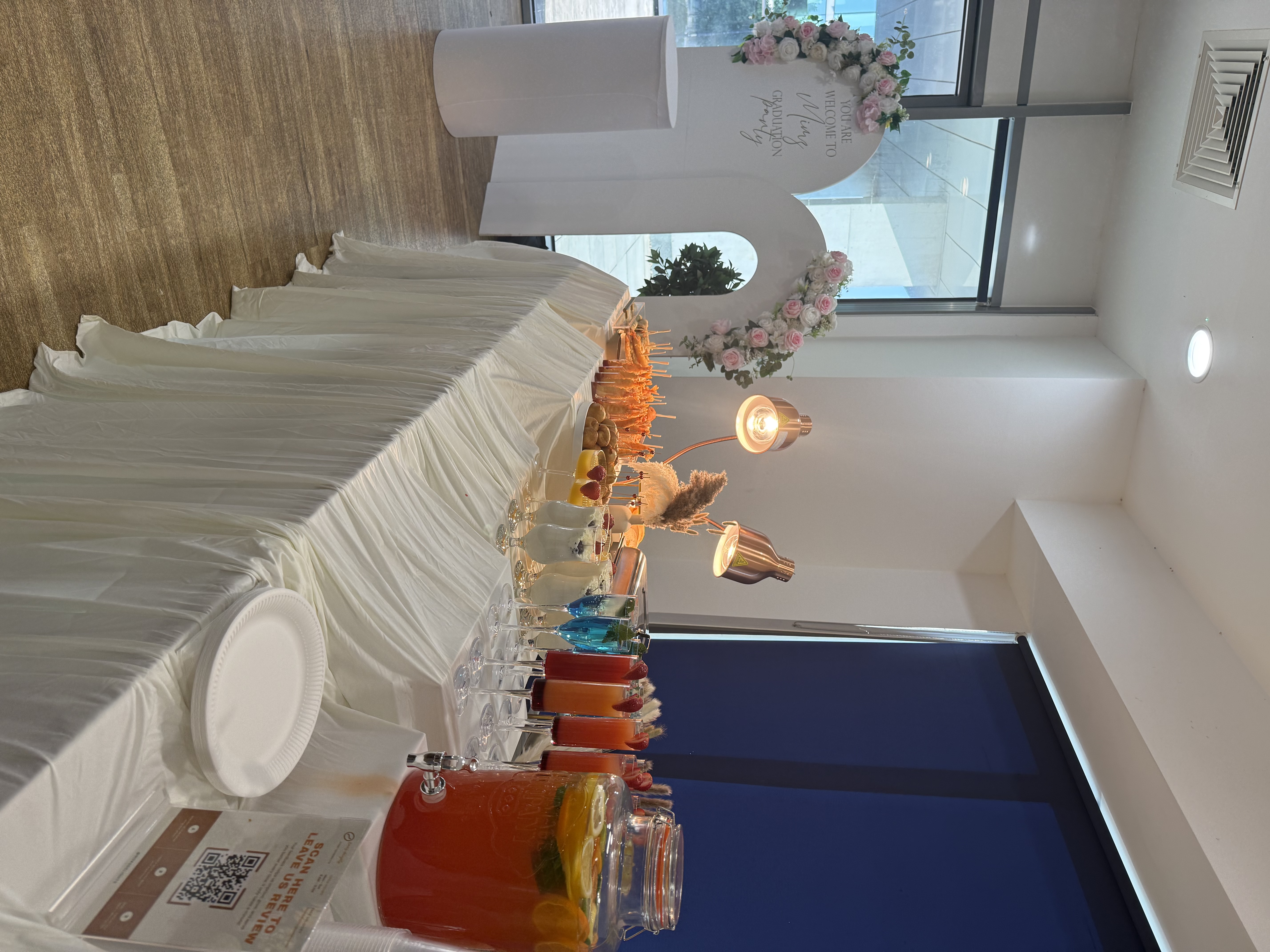 Styled graduation party buffet with canapes and cocktails